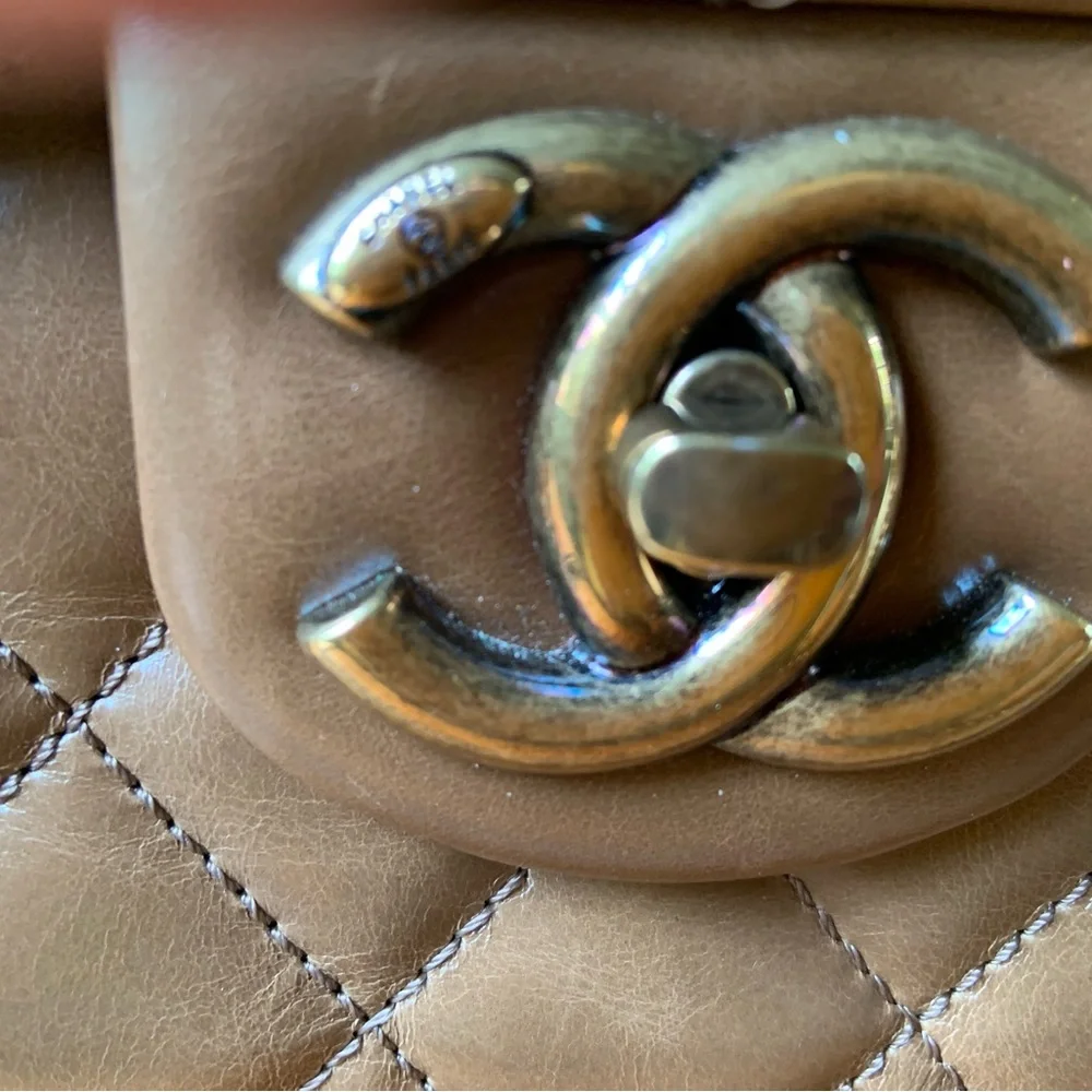 Classic brown lamb‎ skin Chanel handbag with shoulder strap